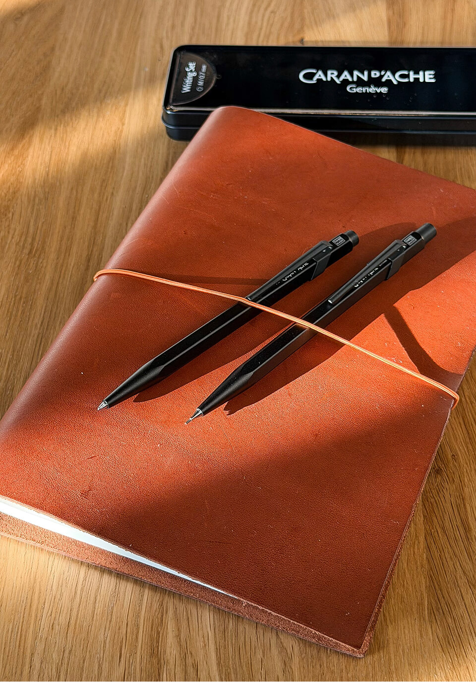 Ручки Caran d'Ache Black Code і блокнот Egolibro