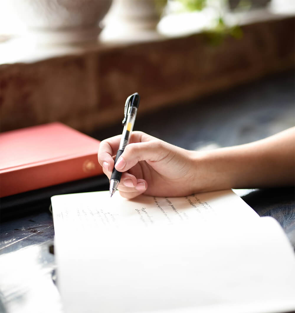 Ручка і записи у блокноті